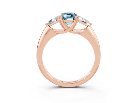 Rose gold Three-Stone Emerald Cut Cut Diamond Ring with Trillion Side Stones and Four-Prong Setting_3