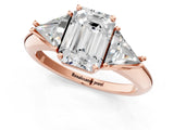 Rose gold Three-Stone Emerald Cut Cut Diamond Ring with Trillion Side Stones and Four-Prong Setting_4
