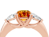 Rose gold Three-Stone Emerald Cut Cut Diamond Ring with Trillion Side Stones and Four-Prong Setting_4