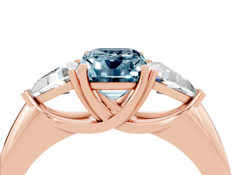 Rose gold Three-Stone Emerald Cut Cut Diamond Ring with Trillion Side Stones and Four-Prong Setting_4