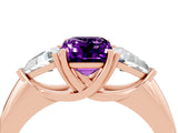 Rose gold Three-Stone Emerald Cut Cut Diamond Ring with Trillion Side Stones and Four-Prong Setting_4