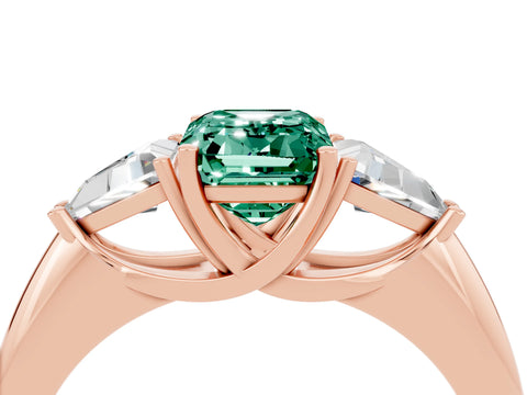 Rose gold Three-Stone Emerald Cut Cut Diamond Ring with Trillion Side Stones and Four-Prong Setting_4