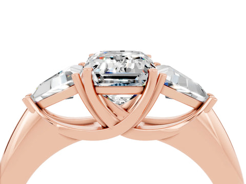 Rose gold Three-Stone Emerald Cut Cut Diamond Ring with Trillion Side Stones and Four-Prong Setting_4