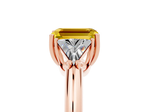 Rose gold Three-Stone Emerald Cut Cut Diamond Ring with Trillion Side Stones and Four-Prong Setting_5