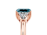 Rose gold Three-Stone Emerald Cut Cut Diamond Ring with Trillion Side Stones and Four-Prong Setting_5