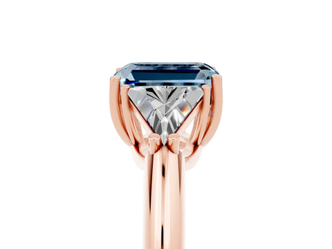 Rose gold Three-Stone Emerald Cut Cut Diamond Ring with Trillion Side Stones and Four-Prong Setting_5