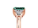 Rose gold Three-Stone Emerald Cut Cut Diamond Ring with Trillion Side Stones and Four-Prong Setting_5