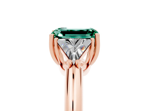 Rose gold Three-Stone Emerald Cut Cut Diamond Ring with Trillion Side Stones and Four-Prong Setting_5