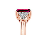 Rose gold Three-Stone Emerald Cut Cut Diamond Ring with Trillion Side Stones and Four-Prong Setting_5