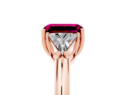 Rose gold Three-Stone Emerald Cut Cut Diamond Ring with Trillion Side Stones and Four-Prong Setting_5