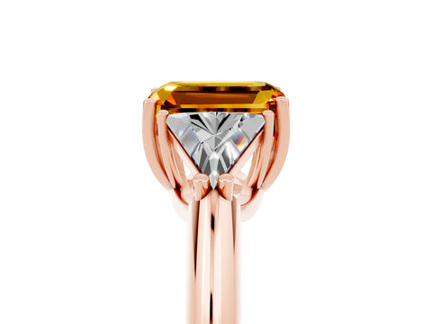 Rose gold Three-Stone Emerald Cut Cut Diamond Ring with Trillion Side Stones and Four-Prong Setting_5