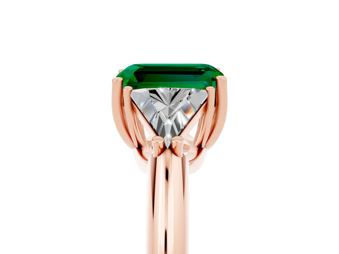 Rose gold Three-Stone Emerald Cut Cut Diamond Ring with Trillion Side Stones and Four-Prong Setting_5