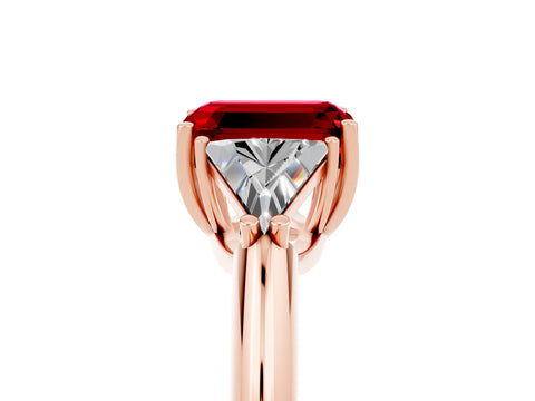 Rose gold Three-Stone Emerald Cut Cut Diamond Ring with Trillion Side Stones and Four-Prong Setting_5