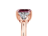 Rose gold Three-Stone Emerald Cut Cut Diamond Ring with Trillion Side Stones and Four-Prong Setting_5