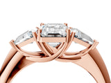 Rose gold Three-Stone Emerald Cut Cut Diamond Ring with Trillion Side Stones and Four-Prong Setting_7