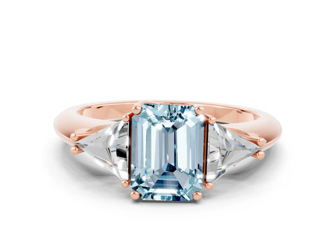 Rose gold Three-Stone Emerald Cut Cut Diamond Ring with Trillion Side Stones and Four-Prong Setting