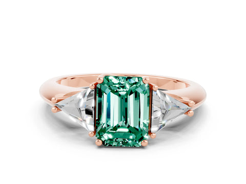 Rose gold Three-Stone Emerald Cut Cut Diamond Ring with Trillion Side Stones and Four-Prong Setting