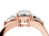 Rose gold Three-Stone Emerald Cut Cut Diamond Ring with Trillion Side Stones on a Split Shank Band_23