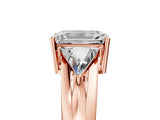 Rose gold Three-Stone Emerald Cut Cut Diamond Ring with Trillion Side Stones on a Split Shank Band_24