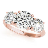Rose gold Three-Stone Emerald Cut Diamond Engagement Ring with Prong Setting on a White Gold Band