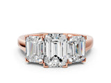 Rose gold Three-Stone Emerald Cut Diamond Ring with Channel Set Band and Four-Prong Setting_18