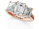 Rose gold Three-Stone Emerald Cut Diamond Ring with Channel Set Band and Four-Prong Setting_19