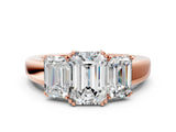 Rose gold Three-Stone Emerald Cut Diamond Ring with Channel Set Band and Four-Prong Setting_20