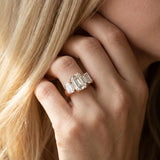 Rose gold Three-Stone Emerald Cut Diamond Ring with Channel Set Band and Four-Prong Setting_23