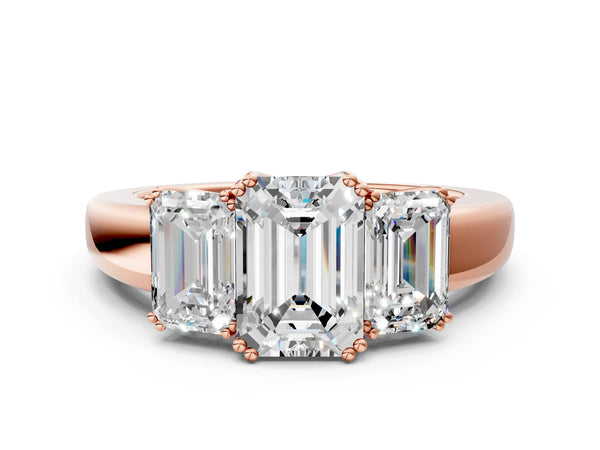 Rose gold Three-Stone Emerald Cut Diamond Ring with Channel Set Band and Four-Prong Setting