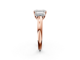 Rose gold Three-Stone Emerald Cut Diamond Ring with Channel-Set Band and Four-Prong Setting_63