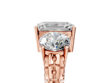 Rose gold Three-Stone Emerald Cut Diamond Ring with Channel-Set Band and Prong Setting_11