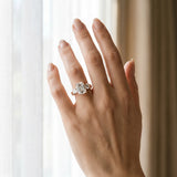 Rose gold Three-Stone Emerald Cut Diamond Ring with Channel-Set Band and Prong Setting_18