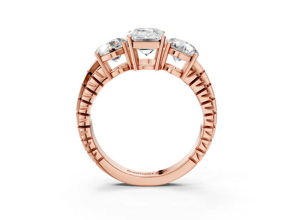 Rose gold Three-Stone Emerald Cut Diamond Ring with Channel-Set Band and Prong Setting