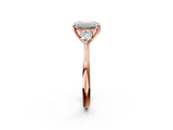 Rose gold Three-Stone Emerald Cut Diamond Ring with Pear Side Stones in Four-Prong Setting_176