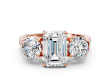 Rose gold Three-Stone Emerald Cut Diamond Ring with Round Accent Stones, Prong Setting, and Classic Band_3