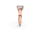 Rose gold Three-Stone Emerald Cut Diamond Ring with Round Side Stones, Classic Band, and Four-Prong Setting_5