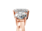 Rose gold Three-Stone Emerald Cut Diamond Ring with Round Side Stones, Classic Band, and Four-Prong Setting_8