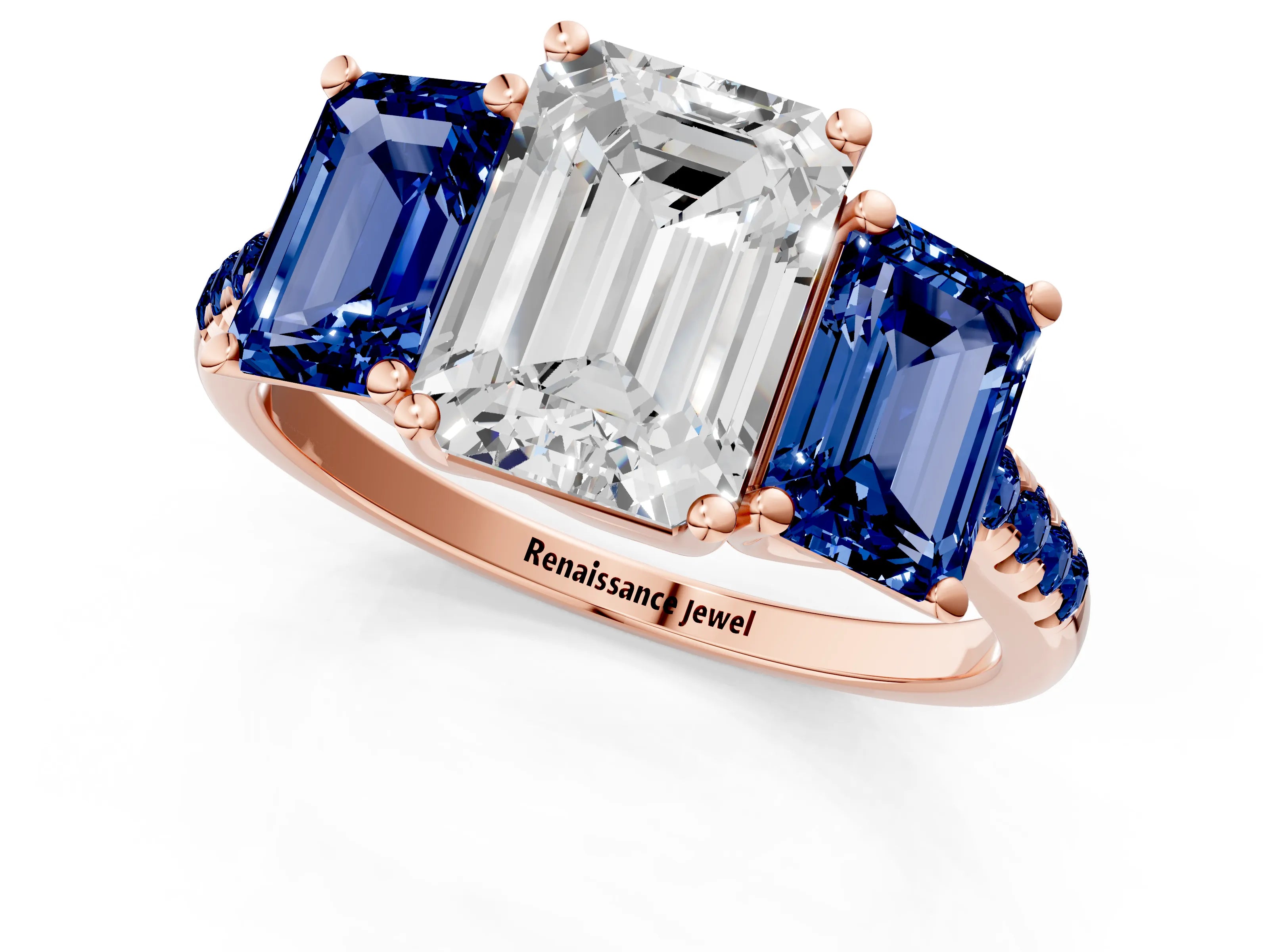 Rose gold Three-Stone Emerald Cut Diamond Ring with Round with Blue Sapphire side stone Pavé Band and Prong Setting_1