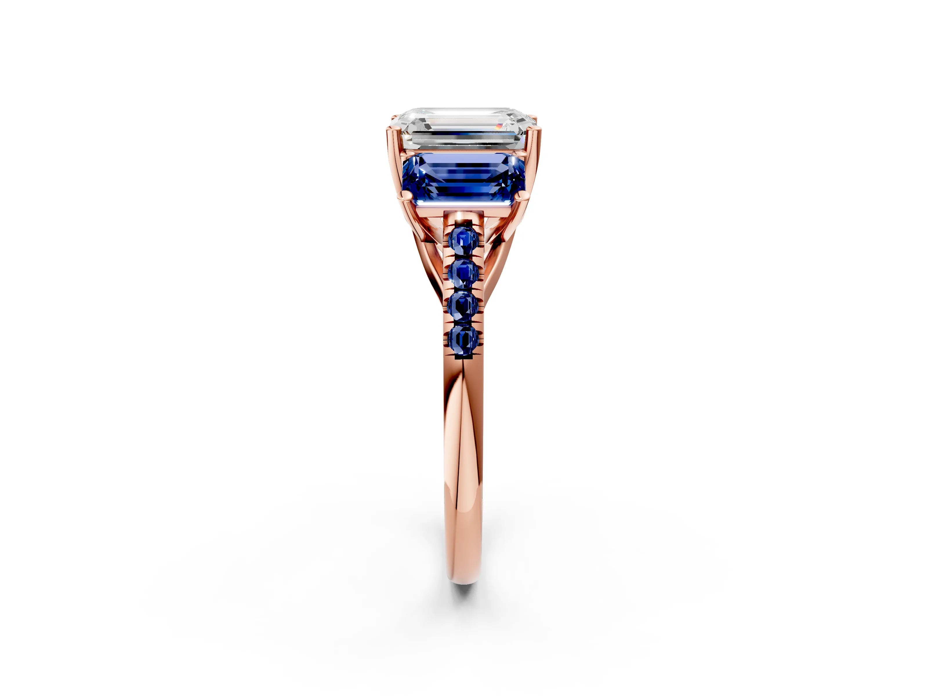 Rose gold Three-Stone Emerald Cut Diamond Ring with Round with Blue Sapphire side stone Pavé Band and Prong Setting_2
