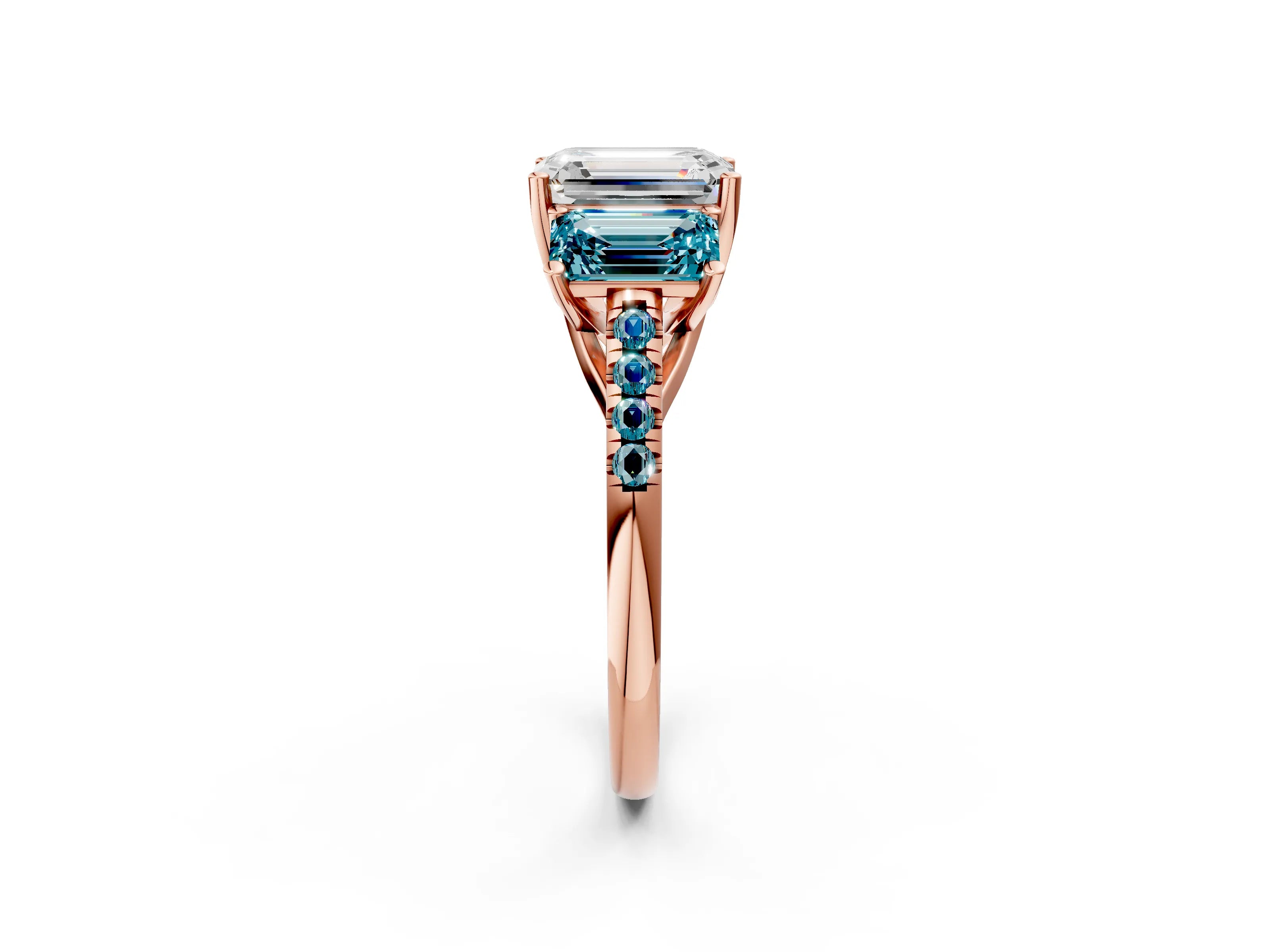 Rose gold Three-Stone Emerald Cut Diamond Ring with Round with Blue Topaz side stone Pavé Band and Prong Setting_2