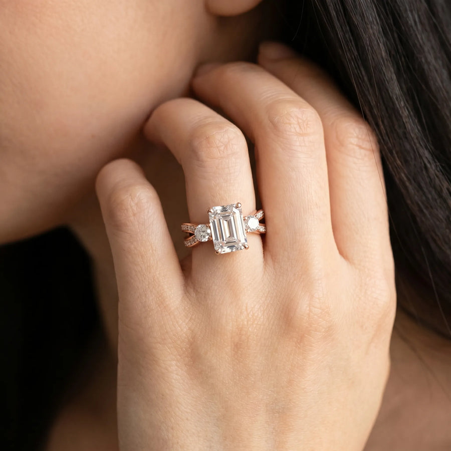 Rose gold Three-Stone Emerald Cut Diamond Twist Band with Prong Setting