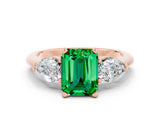 Rose gold Three-Stone Emerald Cut Emerald Ring with Pear Side Stones and Four-Prong Setting