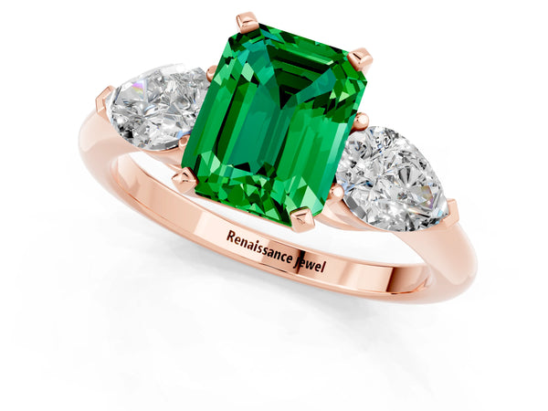 Rose gold Three-Stone Emerald Cut Emerald Ring with Pear Side Stones and Four-Prong Setting