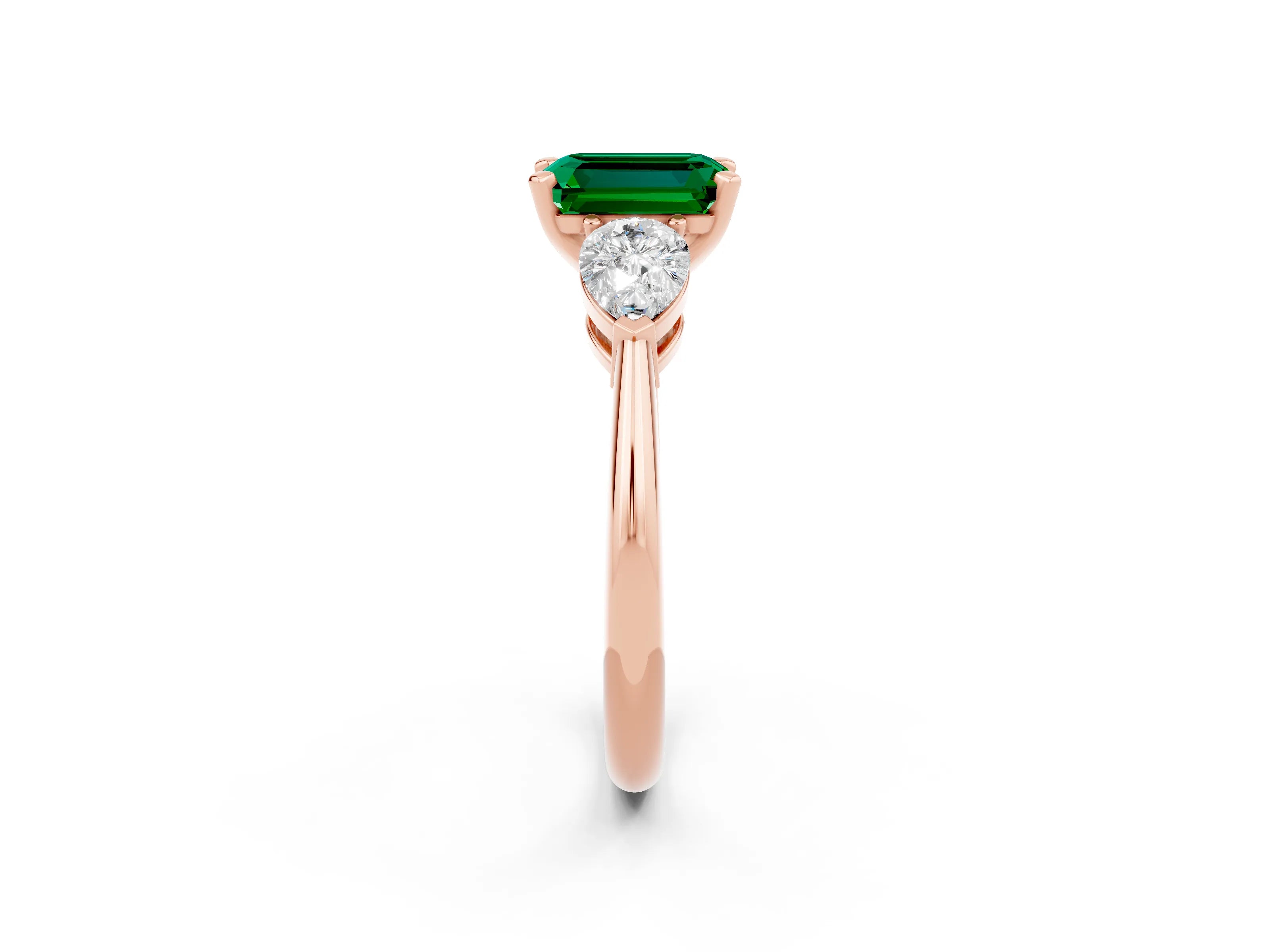 Rose gold Three-Stone Emerald Cut Emerald Ring with Pear Side Stones and Four-Prong Setting_2