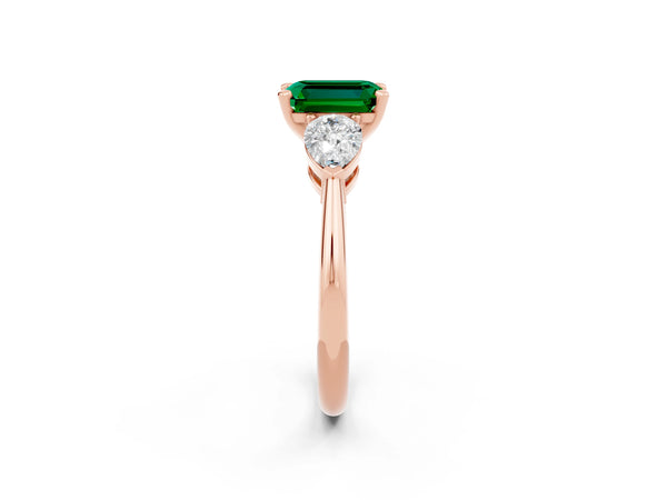 Rose gold Three-Stone Emerald Cut Emerald Ring with Pear Side Stones and Four-Prong Setting