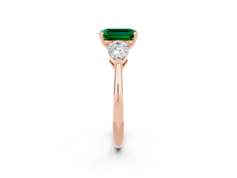 Rose gold Three-Stone Emerald Cut Emerald Ring with Pear Side Stones and Four-Prong Setting_2