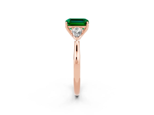 Rose gold Three-Stone Emerald Cut Emerald Ring with Pear  Side Stones in Four-Prong Setting