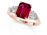 Rose gold Three-Stone Emerald Cut Garnet Ring with Pear Side Stones and Four-Prong Setting_1