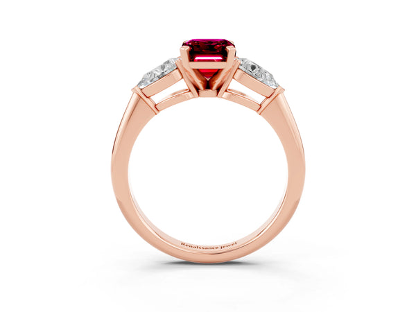Rose gold Three-Stone Emerald Cut Garnet Ring with Pear Side Stones and Four-Prong Setting