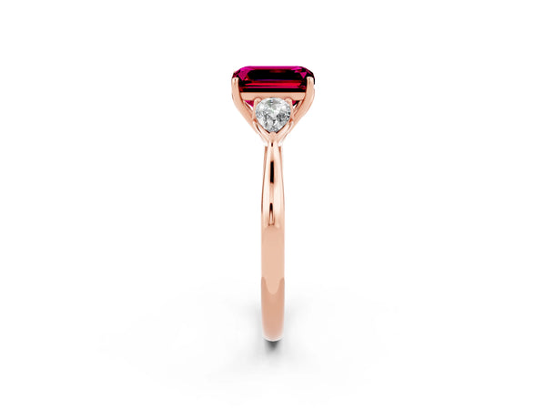 Rose gold Three-Stone Emerald Cut Garnet Ring with Pear  Side Stones in Four-Prong Setting